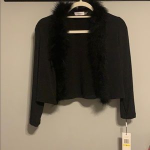 Black throw over- fake fur around the trim